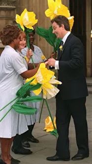 Cancer Prints: Tony Blair at the launch of 1997 Marie Curie Cancer Care Daffodil Campaign at the House