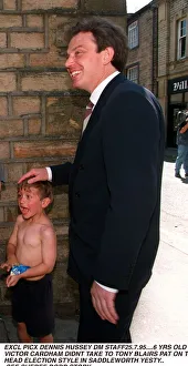 Tony Blair MP getting thirsty whilst working on the campaign trail