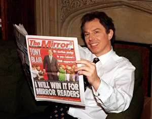 Tony Blair MP Labour Leader reads the Daily Mirror Newspaper at Home