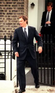00186 Prints: Tony Blair MP Labour Prime Minister with Alastair Campbell press officer leave home in
