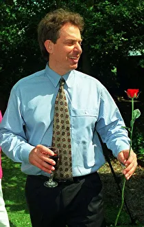 00184 Prints: Tony Blair MP at his surprise party at home to mark his first year as Labour leader 1995