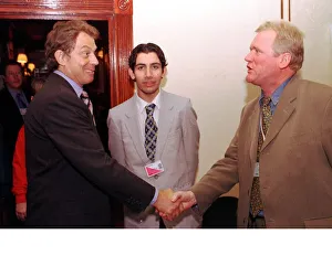 Tony Blair shakes hands with Bob Shields as Alan Cheyne looks on October 1998 Labour