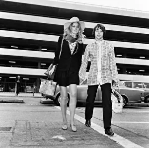 Tony Hicks of British pop group The Hollies sees off his model girlfriend Jane Lumb