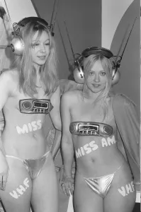 Topless Prints: Topless models promoting in car radios at the 1971 Earls Court motor show 19th October