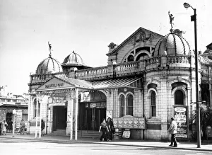 Torquay Pavilions in 1975, shot from the front showing theatre posters from the time