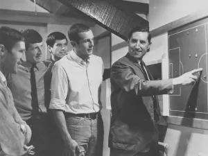 01016 Prints: Torquay United manager Frank O Farrell (right) pictured with some of his players