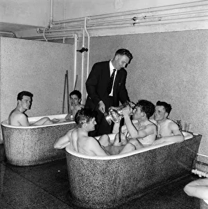 00571 Prints: Tottenham Hotspur Double Winnkng Season 1960 - 1961. A Spurs player drinks from the FA