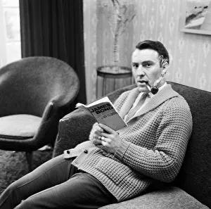 00808 Prints: Tottenham Hotspur and England footballer Jimmy Greaves pictured smoking a pipe