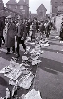 Tottenham Hotspur fans queue at White Hart Lane for tickets for their European Cup match
