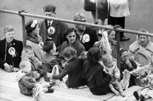00209 Prints: Tottenham Hotspur fans wait for their team to arrive home after defeating Burnley 3-1 in