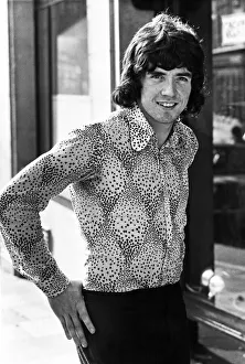 Shirt Prints: Tottenham Hotspur football player Joe Kinnear poses wearing patterned shirt in the street