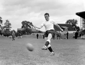 00208 Prints: Tottenham Hotspur footballer Dave Mackay in training August 1961