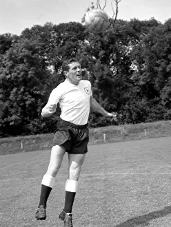 00208 Prints: Tottenham Hotspur footballer Les Allen poses for photgraphers at the team