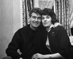 Tottenham Hotspur left back Ron Henry celebrates with his wife Edna at their home in