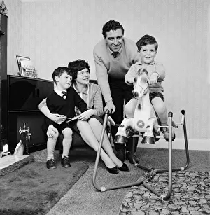 Tottenham Hotspur player Bobby Smith with wife and children at home. November 1960