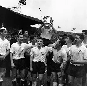Finals Prints: Tottenham Hotspur team celebrate with the FA cup trophy after their win over Leicester