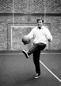 00440 Prints: Tottenham Hotspur winger Terry Medwin practices his ball skills as he trains alone