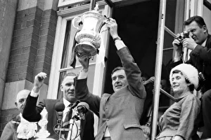 00209 Prints: Tottenham Hotspurcaptain Danny Blanchflower watched by manager Bill Nicholson holds