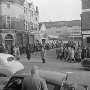 00230 Prints: Tottenham supporters queue outside White Hart Lane for tickets to their European Cup