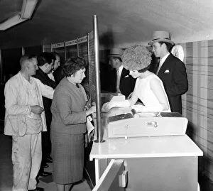 00170 Prints: A touch of Ascot was brought to Manchester when the employees of Demmy betting shop of