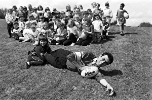 Tough tackler Lisa Gudgeon grounds Kirklees Rugby League Development Manager Mike Rowan