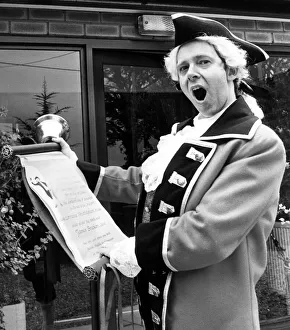 Town Crier David Mitchell awakens Lorraine Breckton of Chester before her wedding