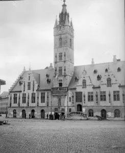 Cobbles Prints: The town hall at Termonde flies the Belgian flag after the town was retaken from
