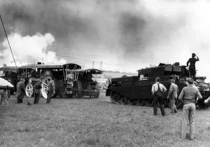 Vintage Prints: Traction engines and a tank having a tug of war at a Steam Rally on 10th June 1961
