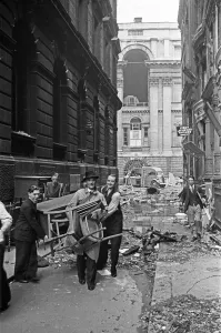 Hose Prints: Traders in Bucklerbury, City of London salvage goods from their premises
