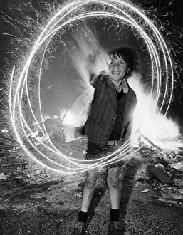 Bonfire Night Prints: The traditional sparkler still holds plenty of magic for eight year old Terry Gibaney of