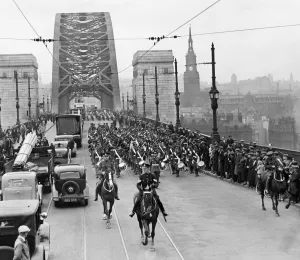 Parades Prints: Traffic halts and crowds line the pavements as five of the regimental bands which will