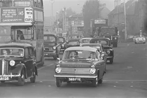 Traffic in High Street Dagenham as the Ford factory turns out at the end of the day shift