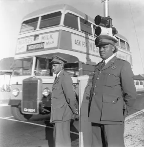 Buses Prints: Traffic police on duty at a set of traffic lights in Cape Town 4th February 1955