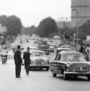 Traffic at Staines Bridge returning from the coast on a hot summer day