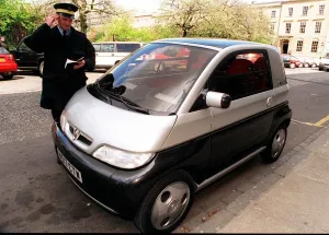 Vauxhall Prints: Traffic Warden Jim Adams confused with Vauxhall Maxx silver black prototype urban car