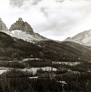 Forest Prints: A train travels through the Rocky Mountains, from Vancouver to banff in Canada