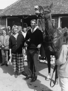 Trainer Kim Bailey and pregnant wife Tracey toast the 1990 Grand National winner Mister