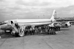 Runway Prints: Transport. Aviation. Planes Boeing 707 personnel photographed alongside the extra staff