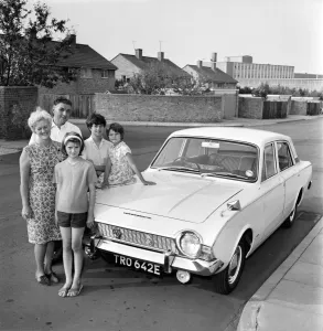 Transport: Cars: Ford Corsair: The Bass family seen here with their new car
