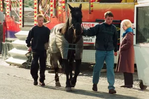 Fair Prints: Traveller lads with one of their horses at the annual Riding the Fair procession sets off