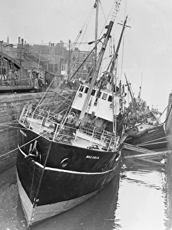 Low Tide Prints: The trawler Magnolia seen here at lowtide at the entrance to St Andrews Dock