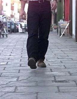 Images Dated 9th November 1999: Tread carefully... a pedestrian walks along Long Street on the controversial cobbles in