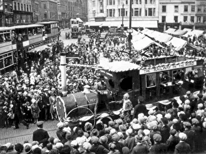 Derbyshire Prints: A Trent Motor Traction Company tableau movers through the crowds in Derby Market Place