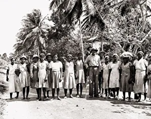 00151 Prints: Trinidad West Indies sugar workers including children in the Woodford lodge estate under