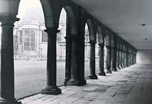 University Prints: Trinity College in Nevilles Court Cambridge Looking through the cloisters