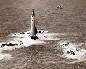 Landscape Prints: A Trinity House steamer waits off the Eddystone Lighthouse to delivery Christmas supplies