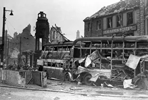 Trolley buses and business premises which were badly damaged in a raid on a town in
