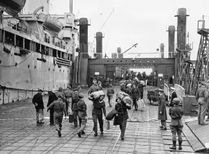 Troops from the British Army of the Rhine (BOAR) leaving the Empire Lance at the Mulberry