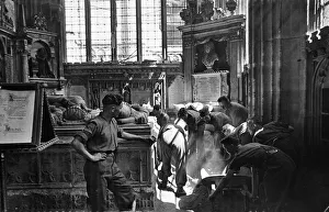 Clearing Prints: Troops clear bomb damage to St Michael Chapel at Canterbury Cathedral after it was