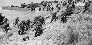 Exercises Prints: Troops coming from assault landing craft ashore during invasion exercises which a re a
